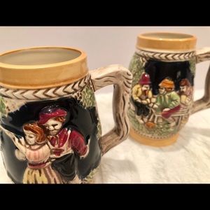 PAIR OF VINTAGE GERMAN CERAMIC BEER STEINS